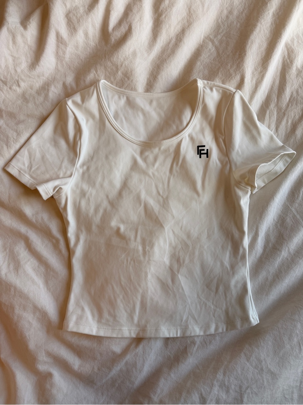 Women’s White Scoop Neck Short Sleeve Tee with Subtle Logo